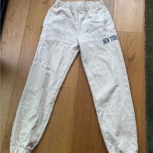 Brandy Melville White Joggers with New York Logo